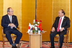 Thủ tướng Nguyễn Xuân Phúc tiếp Chủ tịch kiêm Tổng Giám đốc điều hành Công ty Mitsubishi. (Ảnh: Thống Nhất/TTXVN)