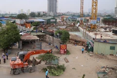 Mặt bằng đang bị cưỡng chế để xây dựng khu tái định cư. (Ảnh Mạnh Khánh/TTXVN)