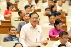  Bộ trưởng Bộ Nông nghiệp và Phát triển nông thôn Nguyễn Xuân Cường, Đại biểu Quốc hội tỉnh Bắc Kạn phát biểu. (Ảnh: Phương Hoa/TTXVN)