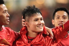 Nụ cười rạng rỡ của Quang Hải - cầu thủ xuất sắc của đội tuyển Việt Nam trong hành trình chinh phục AFF Suzuki Cup 2018. (Ảnh: Trọng Đạt/TTXVN)