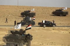 Các lực lượng an ninh Iraq trong một chiến dịch truy quét phiến quân IS. (Nguồn: AFP/TTXVN)