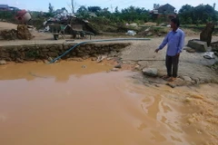 Suối Đại Lào bị ảnh hưởng, bồi lắng do hoạt động khai thác cát. (Ảnh: Nguyễn Dũng/TTXVN)