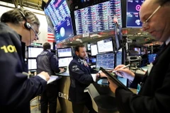 Giao dịch viên tại Sàn giao dịch chứng khoán New York, Mỹ ngày 3/12/2018. (Ảnh: THX/TTXVN)