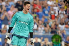 Thủ thành Thibaut Courtois ăn mừng chiến thắng trước PSG. (Ảnh: Getty Images)