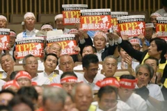 Hàng nghìn nông dân Nhật Bản đã xuống đường biểu tình phản đối TPP. (Ảnh: Kyodo)