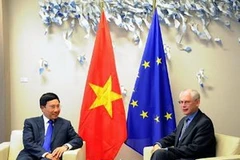 Chủ tịch Hội đồng Châu Âu Van Rompuy tiếp Bộ trưởng Bộ ngoại giao Phạm Bình Minh. (Ảnh: Vân Khoa/TTXVN)