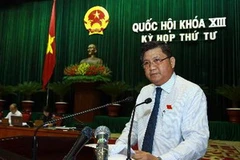 Chủ nhiệm Ủy ban kinh tế của Quốc hội Nguyễn Văn Giàu trình bày Báo cáo của Ủy ban thường vụ Quốc hội giải trình, tiếp thu, chỉnh lý dự thảo Luật hợp tác xã (sửa đổi). (Ảnh: Doãn Tấn/TTXVN)