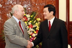 Chủ tịch nước tiếp Đại sứ Romania Dumitru Olaru. (Ảnh: Nguyễn Khang/TTXVN)