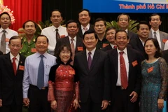 Chủ tịch nước Trương Tấn Sang với các đại biểu dự hội nghị. (Ảnh: Thanh Vũ/TTXVN)