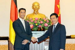 Bộ trưởng Phạm Bình Minh tiếp Bộ trưởng Philipp Roesler. (Ảnh: Dương Giang/TTXVN)