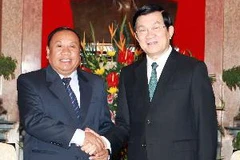 Chủ tịch nước Trương Tấn Sang tiếp ông Phănđuôngchit Vôngxả. (Ảnh: Nguyễn Khang/TTXVN)