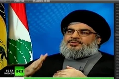 Cuộc phỏng vấn giữa Assange với Nasrallah đã thực hiện qua videolink. (Nguồn: ibtimes.com) 