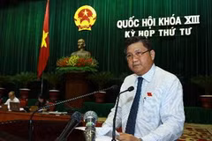 Chủ nhiệm Ủy ban kinh tế của Quốc hội Nguyễn Văn Giàu trình bày Báo cáo của Ủy ban thường vụ Quốc hội giải trình, tiếp thu, chỉnh lý dự thảo Luật hợp tác xã (sửa đổi). (Ảnh: Doãn Tấn/TTXVN)