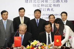 Quang cảnh lễ ký kết. (Ảnh: Thế Duyệt/TTXVN)