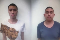 Hai đối tượng lừa tiền của shipper bị bắt giữ (ảnh Cơ quan công an cung cấp) 