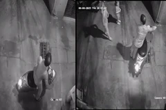 Hình ảnh người đàn ông và hai cháu bé được camera ghi lại (Ảnh cắt từ Clip) 