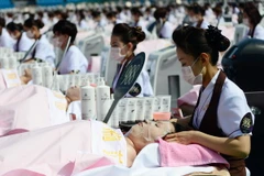 [Photo] 1.000 tình nguyện viên tham gia lập kỷ lục về massage