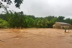 Nước lũ ngày càng dâng cao trên địa bàn xã Phú Sơn, huyện Bù Đăng, tỉnh Bình Phước. (Ảnh: Đậu Tất Thành/TTXVN)