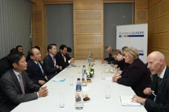 Thủ tướng Nguyễn Xuân Phúc gặp song phương Thủ tướng Na Uy Erna Solberg bên lề Hội nghị Cấp cao Á-Âu lần thứ 12 (ASEM 12) tại Bỉ năm 2018. (Ảnh: Thống Nhất/TTXVN)