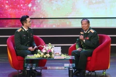 Đại biểu khách mời giao lưu tại chương trình. (Ảnh: Dương Giang/TTXVN)