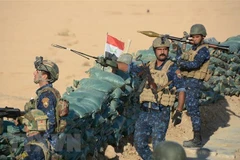 Các lực lượng Iraq làm nhiệm vụ trong chiến dịch truy quét IS. (Nguồn: AFP/TTXVN)