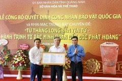 Lễ công bố quyết định công nhận bảo vật Quốc gia. (Ảnh: Văn Đức/TTXVN)