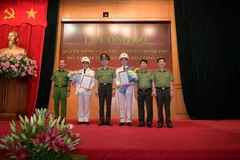 Thừa ủy quyền của Thủ tướng Chính phủ, Bộ trưởng Tô Lâm trao Quyết định bổ nhiệm chức vụ Thứ trưởng Bộ Công an đối với Trung tướng Lương Tam Quang và Thiếu tướng Nguyễn Duy Ngọc.