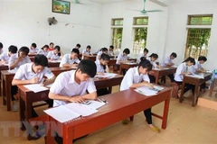Thí sinh thi tại một điểm thi Trung học phổ thông Quốc gia năm 2018. (Ảnh: Hải Yến/TTXVN)