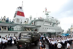 Cán bộ, chiến sỹ hoàn thành nghĩa vụ và nghỉ phép về với gia đình đón Tết Kỷ Hợi 2019. (Ảnh: Hoàng Hùng/TTXVN)