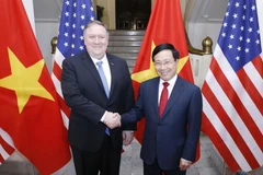 Phó Thủ tướng, Bộ trưởng Ngoại giao Phạm Bình Minh và Bộ trưởng Ngoại giao Mỹ Mike Pompeo hội đàm. (Ảnh: Lâm Khánh/TTXVN)