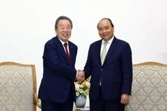 Thủ tướng Nguyễn Xuân Phúc tiếp ông Han Chang-woo, Chủ tịch Tập đoàn Maruhan (Nhật Bản). (Ảnh: Thống Nhất/TTXVN)