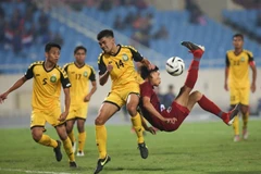 Kết thúc trận đấu đội tuyển Thái Lan giành chiến thắng với tỷ số 8-0, tạm thời đứng đầu bảng K sau lượt trận thứ 2. (Ảnh: Trọng Đat/TTXVN)