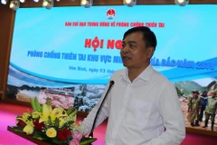 Thứ trưởng Bộ Nông nghiệp và Phát triển nông thôn Nguyễn Hoàng Hiệp phát biểu khai mạc phiên họp. (Ảnh: Nhan Sinh/TTXVN)