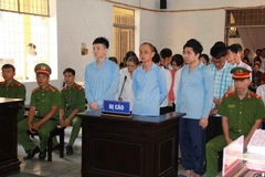 Các bị cáo tại phiên tòa. (Ảnh: Phạm Cường/TTXVN)