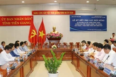 Quang cảnh buổi lễ ký kết hợp đồng. (Ảnh: Nam Thái/TTXVN)