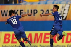 Các cầu thủ Becamex Bình Dương trong một trận đấu. (Ảnh: Hải Âu/TTXVN)