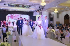 Lễ cưới tập thể của 19 cặp đôi công nhân lao động trên địa bàn tỉnh Thái Nguyên. (Ảnh: Quân Trang/TTXVN)