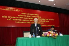 Tổng Bí thư, Chủ tịch nước Nguyễn Phú Trọng đến thăm, nói chuyện với cán bộ, nhân viên Đại sứ quán, đại diện cộng đồng, lưu học sinh và doanh ngiệp Việt Nam tại Lào. (Ảnh: Trí Dũng/TTXVN)