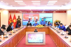 Phó Bí thư Đoàn Thanh niên Cộng sản Hồ Chí Minh TTXVN Cao Chử Diệu Linh báo cáo tổng kết công tác Đoàn và phong trào thanh niên năm 2023. (Ảnh: Minh Đức/TTXVN))