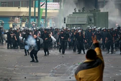 Vụ ẩu đả giữa người biểu tình và an ninh Ai Cập trong các vụ bạo lực diễn ra ở tỉnh Giza vào năm 2013. (Ảnh: nationalpost.tumblr.com)