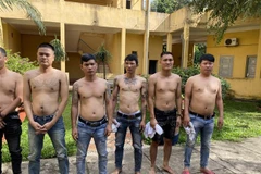 Các đối tượng bị bắt giữ tại cơ quan chức năng. (Ảnh: TTXVN phát)