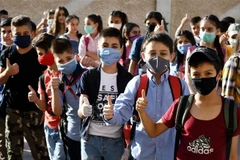 Học sinh đeo khẩu trang phòng lây nhiễm COVID-19 tại trường học ở Damascus, Syria, ngày 13/9/2020. (Ảnh: THX/TTXVN)