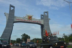 Lễ truy điệu, quy tập hài cốt liệt sỹ từ Campuchia trở về an táng tại nghĩa trang huyện biên giới Đức Cơ. (Ảnh: Tư liệu Đội K52 cung cấp/TTXVN phát)