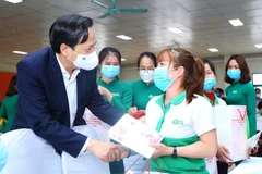 Bộ trưởng Đào Ngọc Dung cho biết giải pháp đột phá năm nay của ngành Lao động-Thương binh và Xã hội chính là phải tập trung cao nhất xây dựng thị trường lao động. (Ảnh minh hoạ: TTXVN)