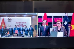 Lễ ký kết Bản ghi nhớ được tổ chức theo hình thức trực tuyến tại hai điểm cầu Việt Nam và Australia. (Ảnh: PV/Vietnam+)