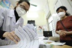 Thời gian qua xảy ra tình trạng nhân viên y tế “ồ ạt” xin nghỉ việc xuất hiện ở nhiều địa phương. (Ảnh minh họa: Minh Quyết/TTXVN)