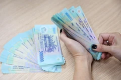 Một số doanh nghiệp dệt may, da giày đã thông báo thưởng Tết 1-2 tháng lương. (Ảnh minh hoạ: PV/Vietnam+)