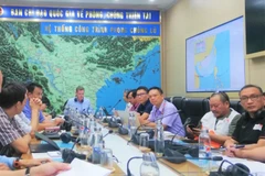 Tổng cục Phòng, chống thiên tai và các đối tác quốc tế họp bàn kích hoạt việc cứu trợ người dân bị ảnh hưởng bởi bão số 4-Noru. (Ảnh: PV/Vietnam+)