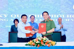 Lễ ký kết Quy chế phối hợp giữa Bộ Công an và Bộ Kế hoạch và Đầu tư, chiều ngày 14/10. (Ảnh: Vietnam+)