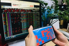 Tuần qua, các nhà đầu tư nước ngoài vẫn bán ròng mạnh với giá trị gần 3.135 tỷ đồng trên sàn HoSE. (Ảnh: Vietnam+)